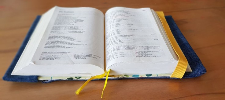 Bible opened up at the psalms