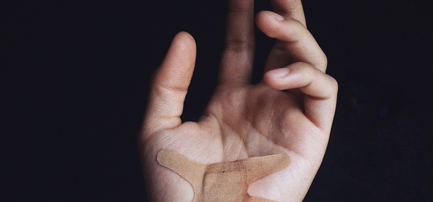 hand with a bandaid
