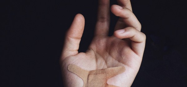 hand with a bandaid